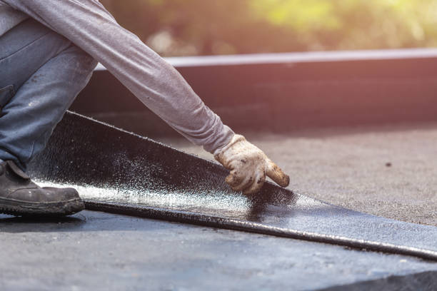 Professional Waterproofing technician working in Otsego, MI